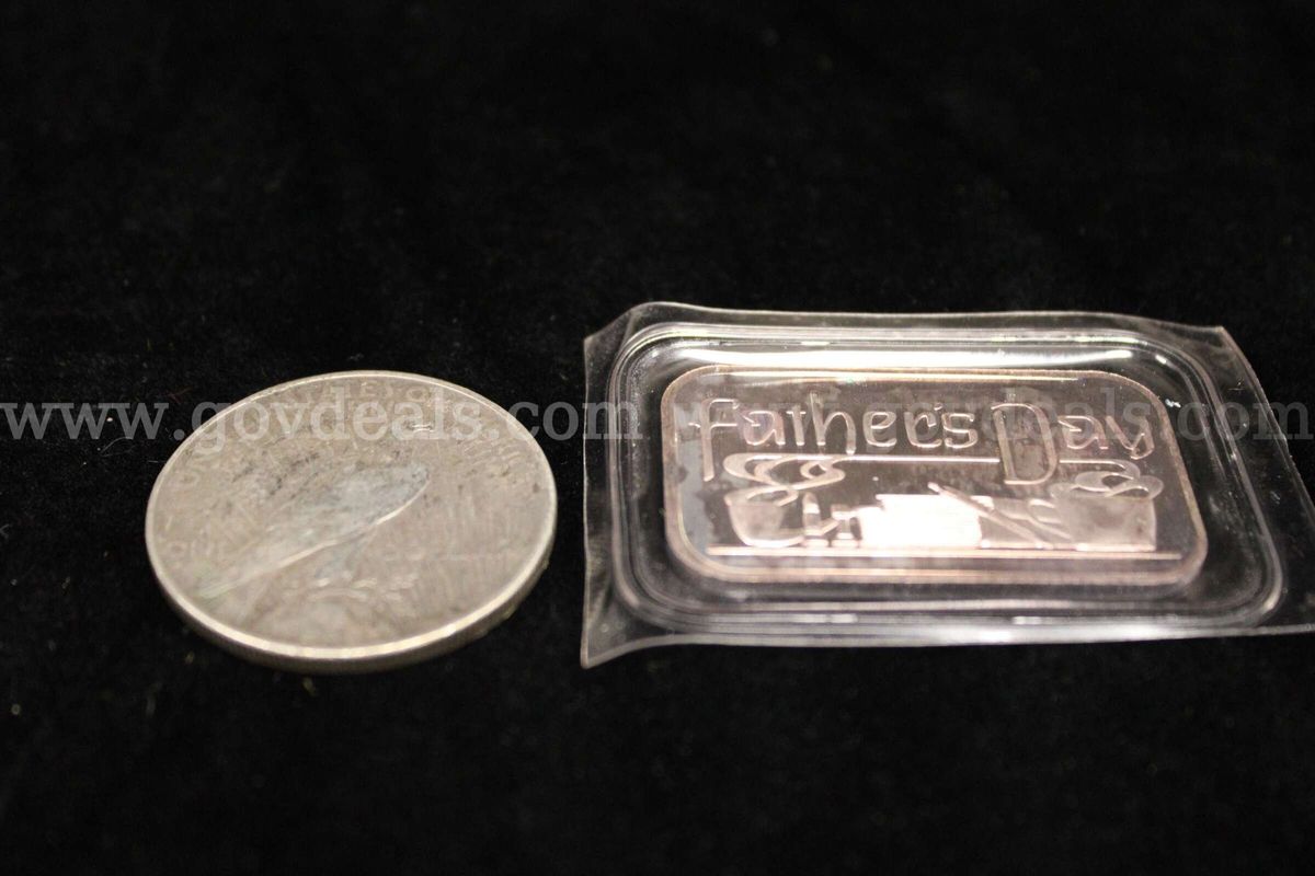 $1 Coin (1); Metal Bar (1)