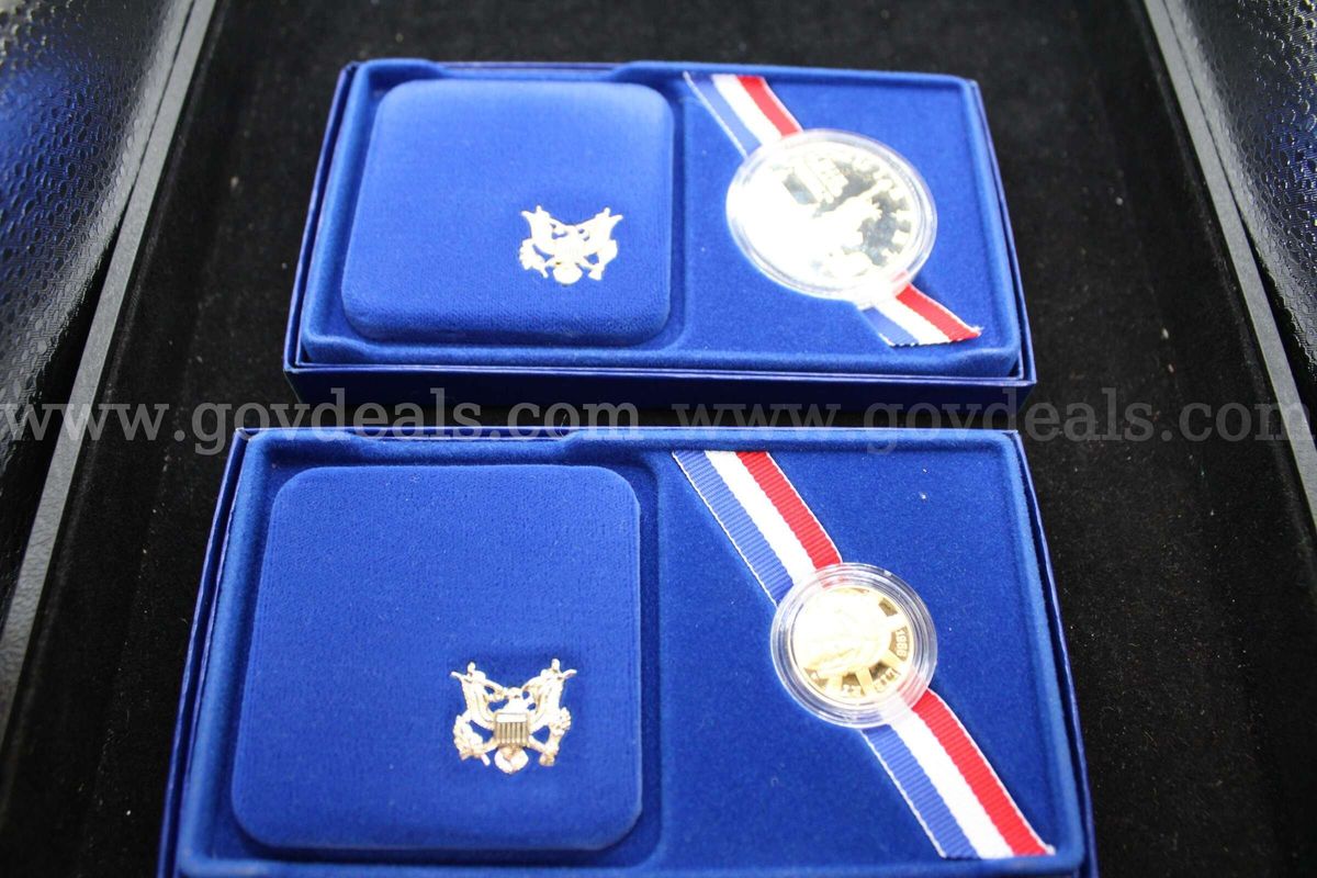 3 Coin Sets, 6 $20.00 Bills, 111 $1.00 Coins, 36 Half Dollar Coins, $73.50