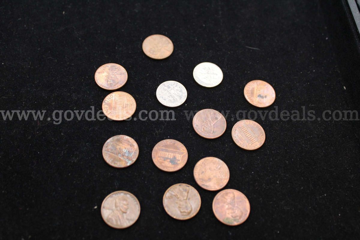 2 Dimes 12 pennies