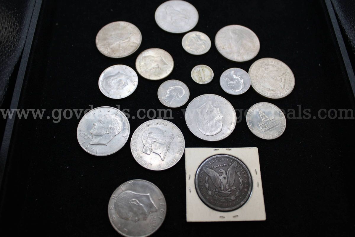 $2.00 Bill (1) Silver Dollar (3) 25 cent (3) Dime (1) Penny (2) For