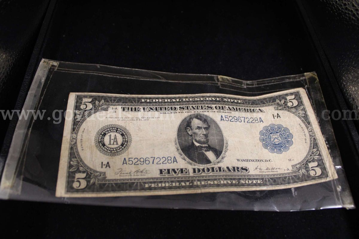 $5.00 Bill(1) Pennies (3)