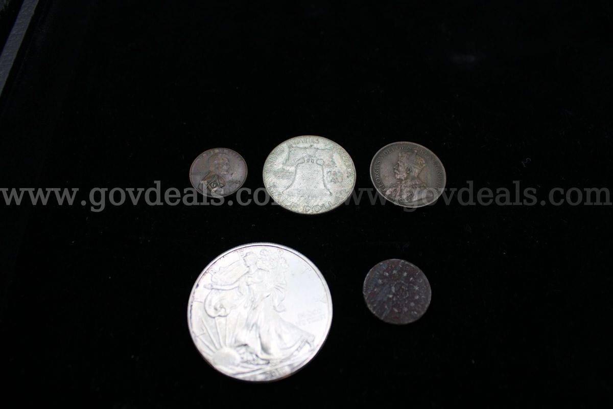 PENNY (1); FOREIGN (2); HALF DOLLAR (1); $1 COIN (1)