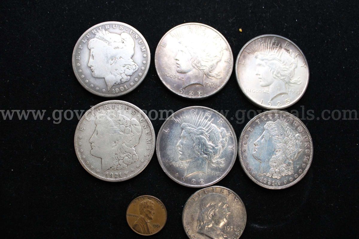 $1 COIN (6); HALF DOLLAR (1); PENNY (1)