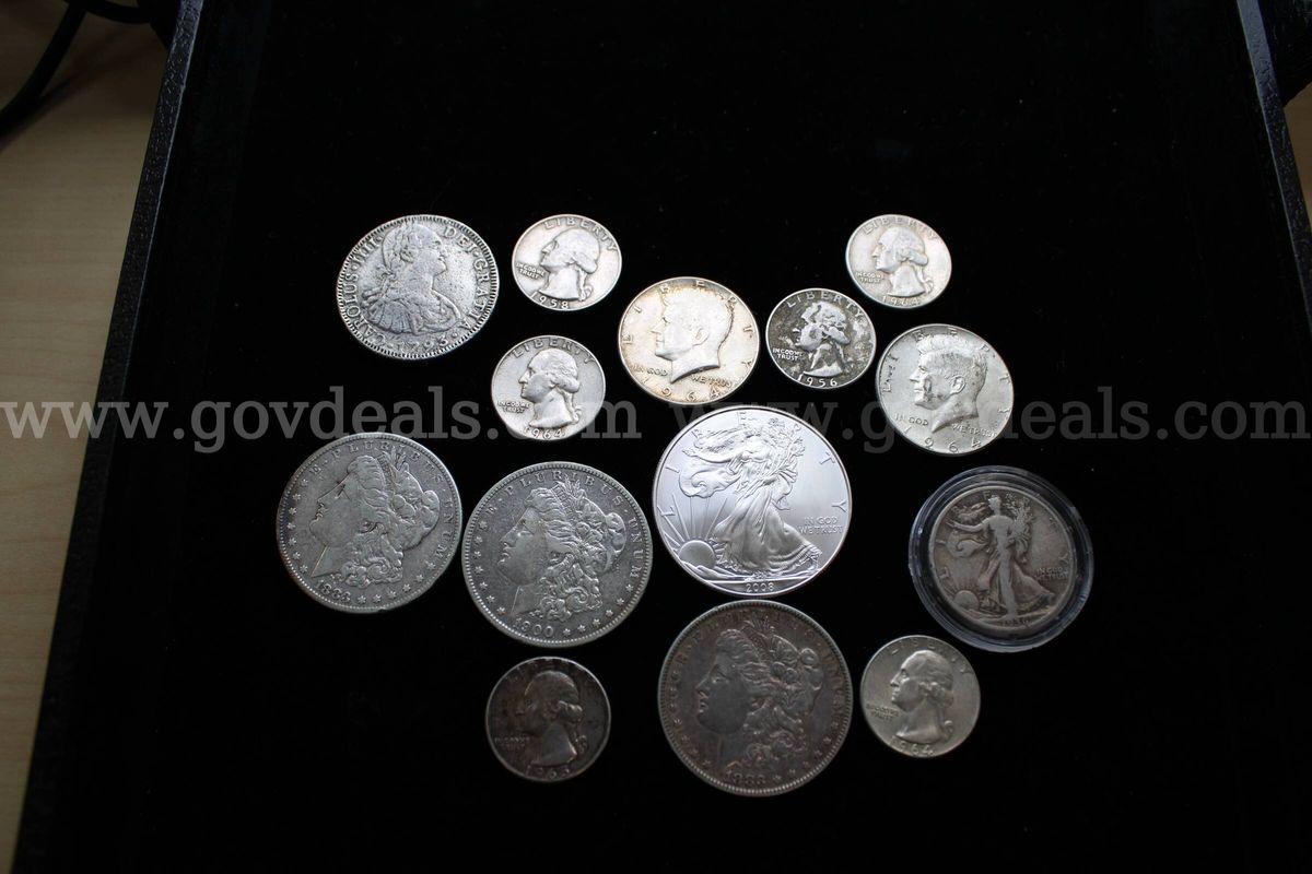 $1.00 COIN (4), 0.50 COIN (3), 0.25 COIN (6), FOREIGN COIN (1)