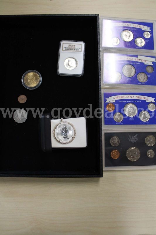 COIN SETS (4); HALF DOLLAR (1); FOREIGN COIN (3); NICKEL (1); TOKEN (1)
