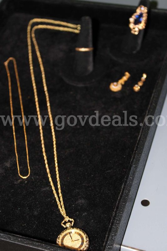 Pocket Watch (2) Rings (2) Charm (1) Earrings (2) Chain (1)