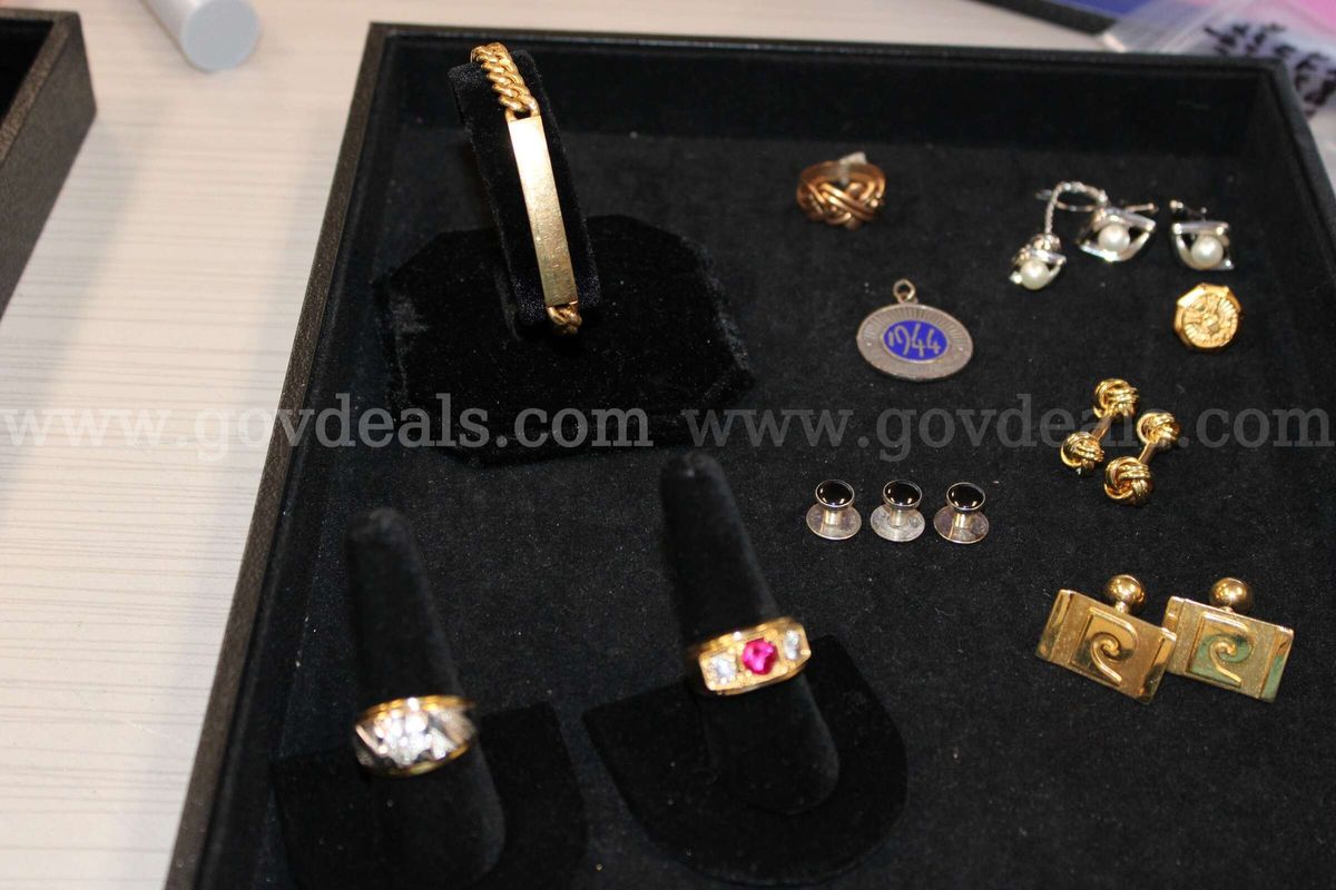 Watch (1) Ring (3) Bracelet (1) Cuff Link Pair (3) Tie (1) Charm (1