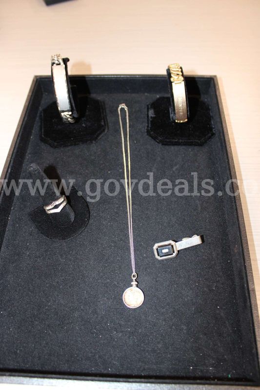 RING (1); TIE TAC (1); BRACELET (2); NECKLACE (1)