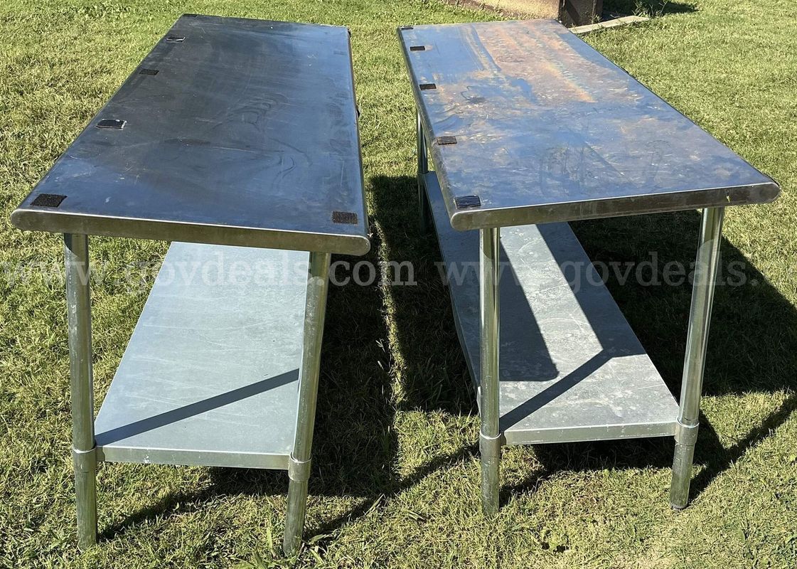 Two (2) Work Tables with Shelf. One has bowed shelf