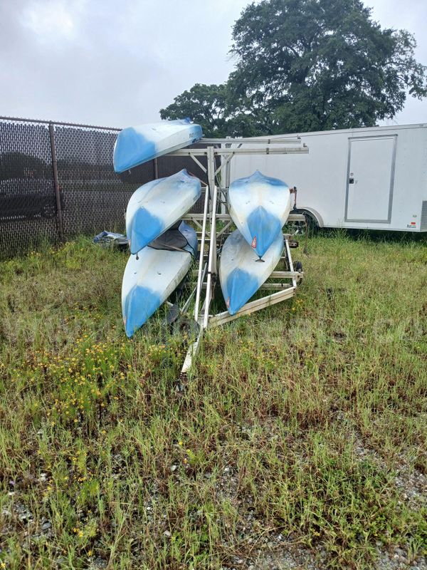 5 Blue Kayaks and Kayak Trailer