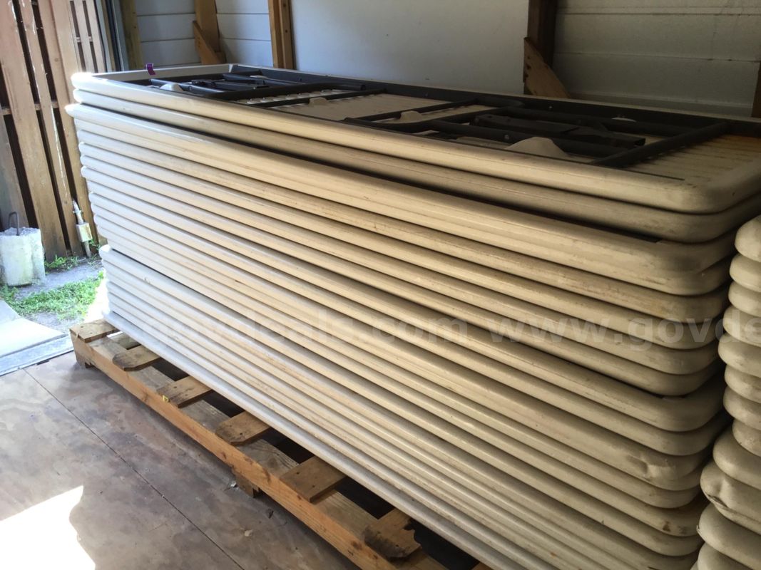 42 -Tan 8’ Folding Tables and 35 Tan cushion chairs