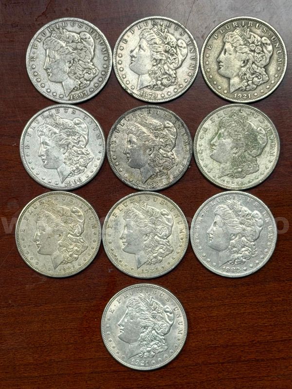 Lot of 10 U.S. Morgan Silver Dollars (1897-S, 1879-O, 1921, 1900, 1884-O, 1921-S, 1921-S, 1921, 1882-O, 1921)