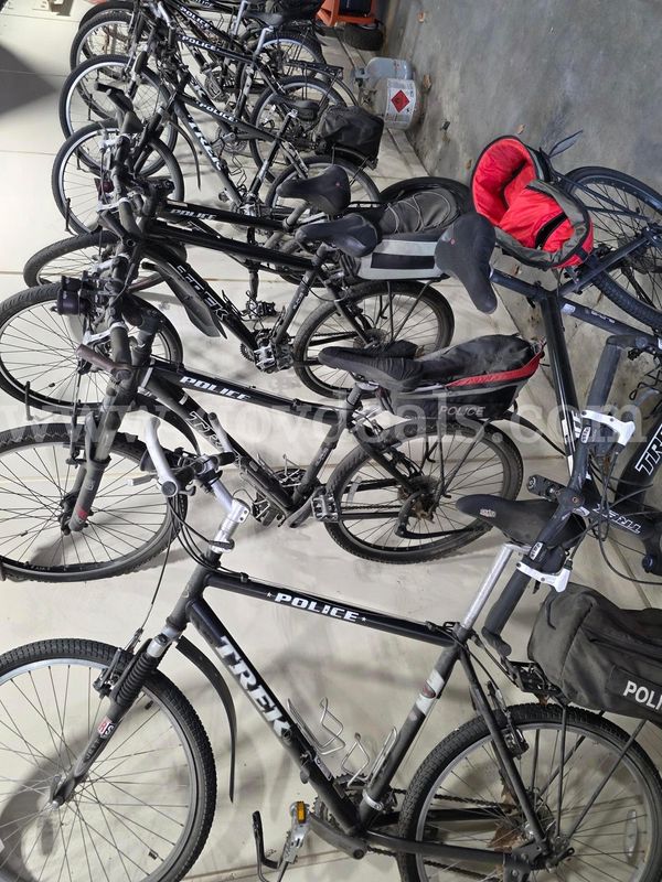 9 TREK Bicycles & 6 Bike Racks