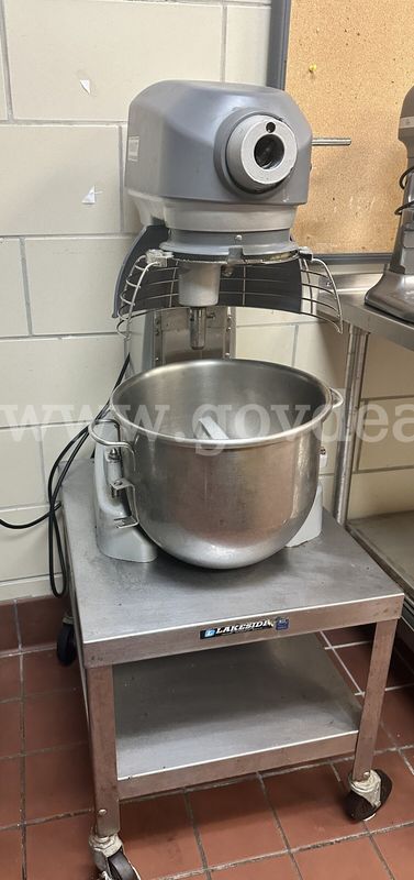 All purpose mixing machine, with some baking accessories.