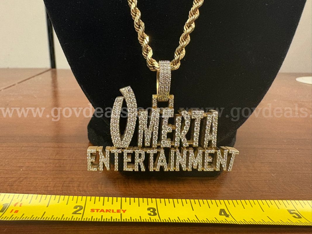 Two 10k yellow gold rope chains with diamond medallions