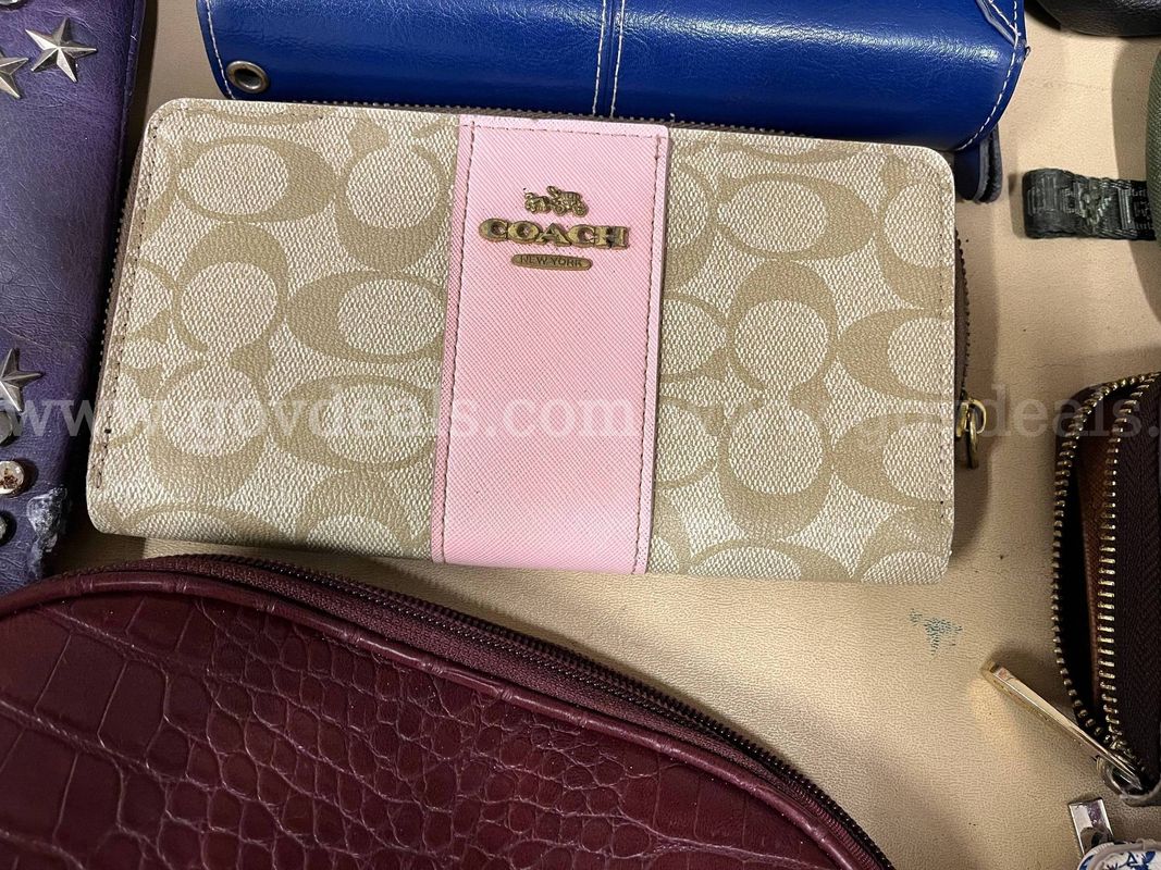 Lot of women's purses and wallets