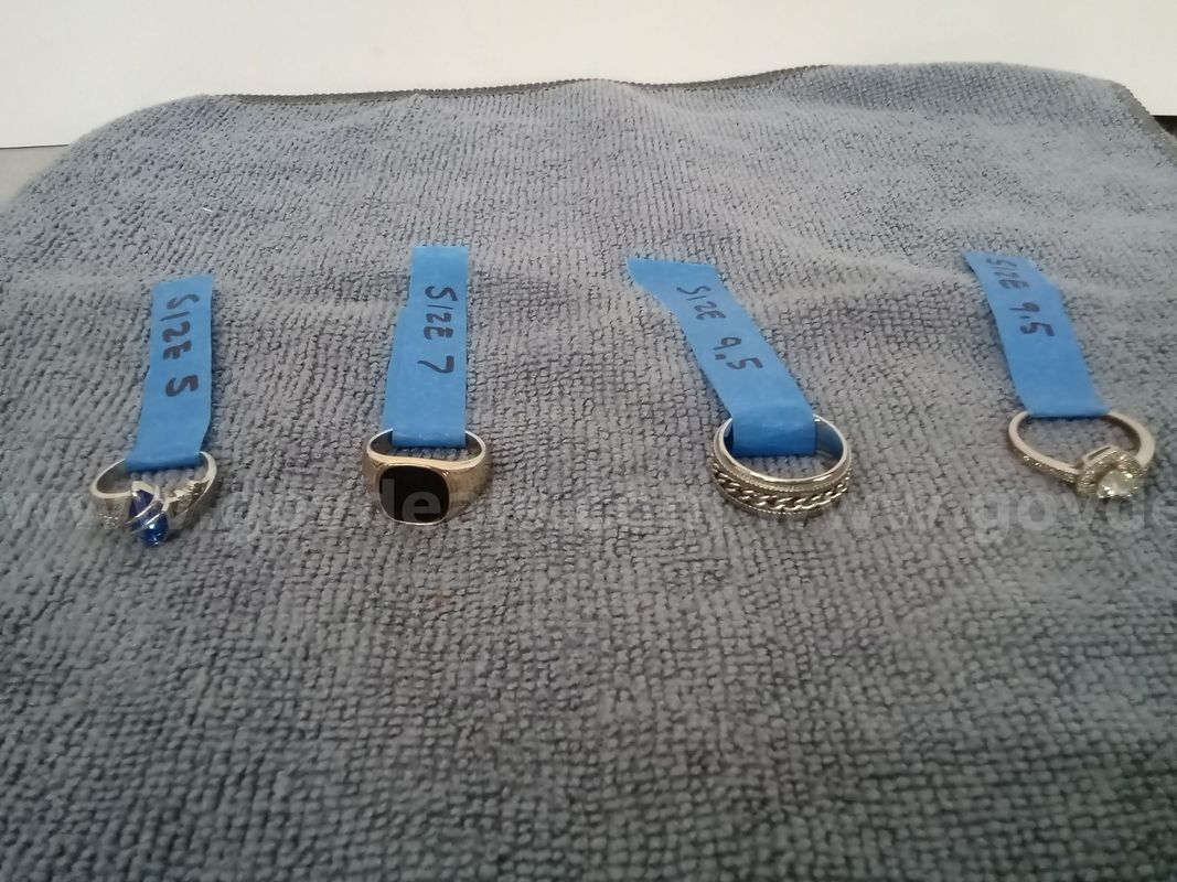 4 Rings - 1 class ring, 2 Silver-tone, 1 gold-tone