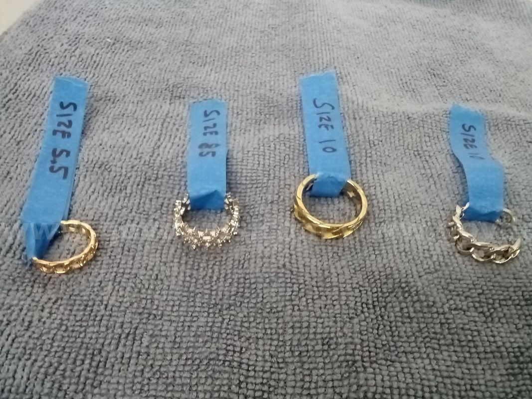 3 Rings - 1 Silver-tone, 1 Gold-tone, 1 Brass/Copper-tone and 1 Silver-tone Cuff