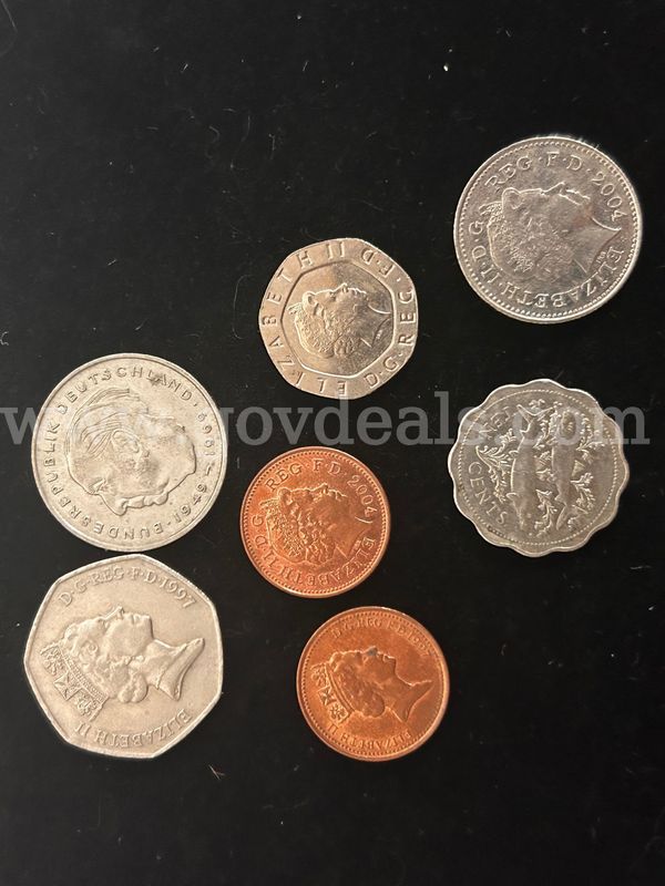 Seven Assorted Foreign Coins