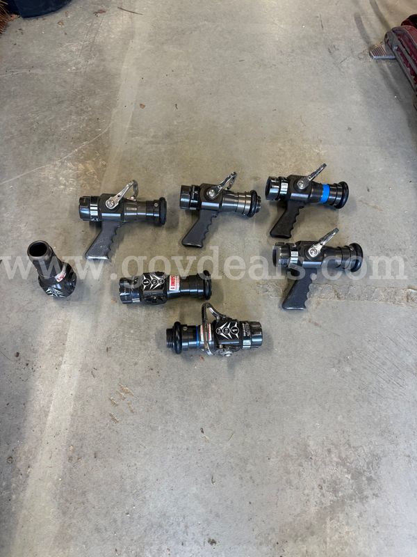 Seven (7) Elkhart Brass 1.75 Inch Adjustable Solid Stream Nozzles & Stacked Tips (lot 2)