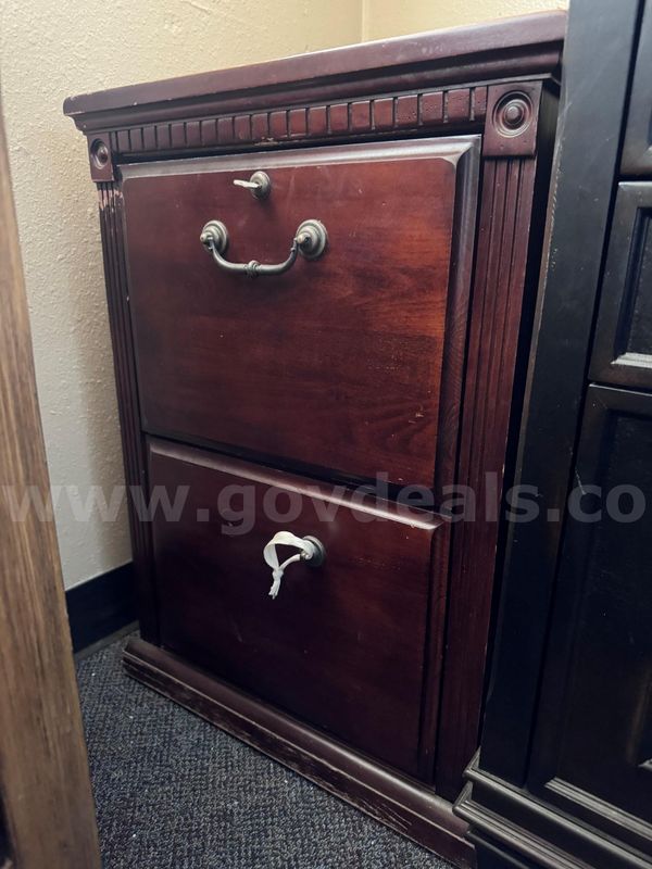 Red wooden file cabinet.