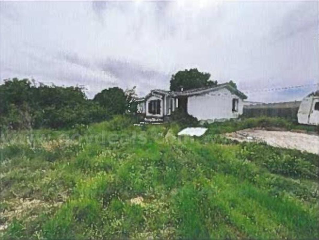 5 Acres of Agricultural Land with Structures in Madill, Oklahoma