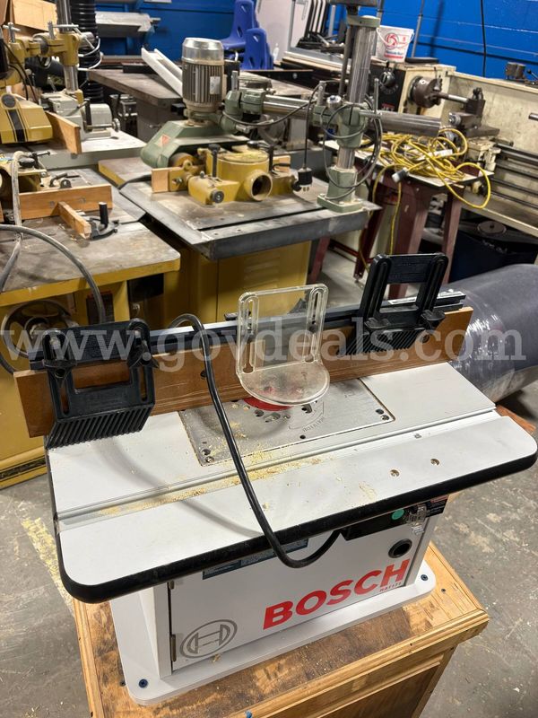 Bosch table top router on a cabinet