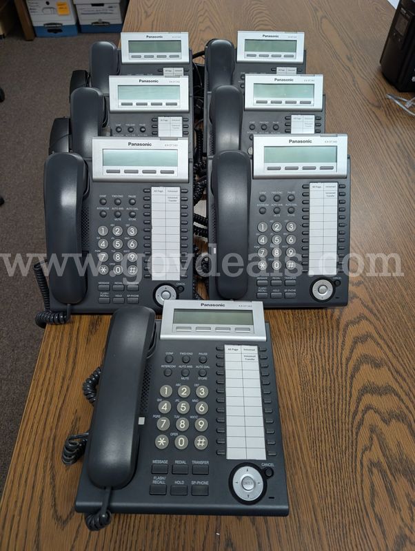 Panasonic phone system - 7 Phones, 1 System Control Unit, 1 Voice Mail System (KX-DT343, KX-TDA50G, KX-TVA50), and UPS