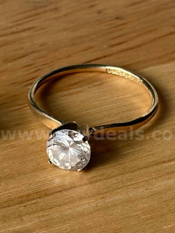 TiDDRs: 14K Gold Classic Engagement Ring with Cubic Zirconia. Size 7. Confirmed by jeweler.