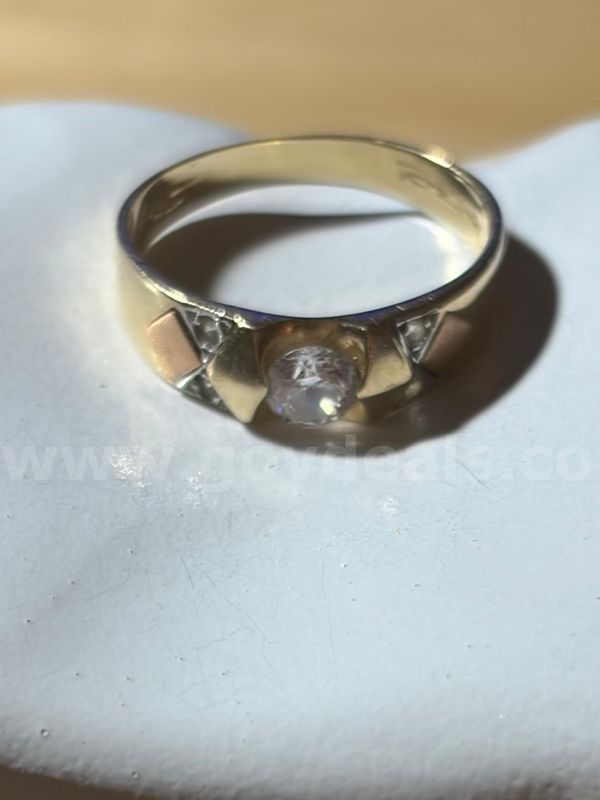 TiDDRs: 14K Gold Two-tone CZ Ring size 6.5. Evaluated by a jeweler.