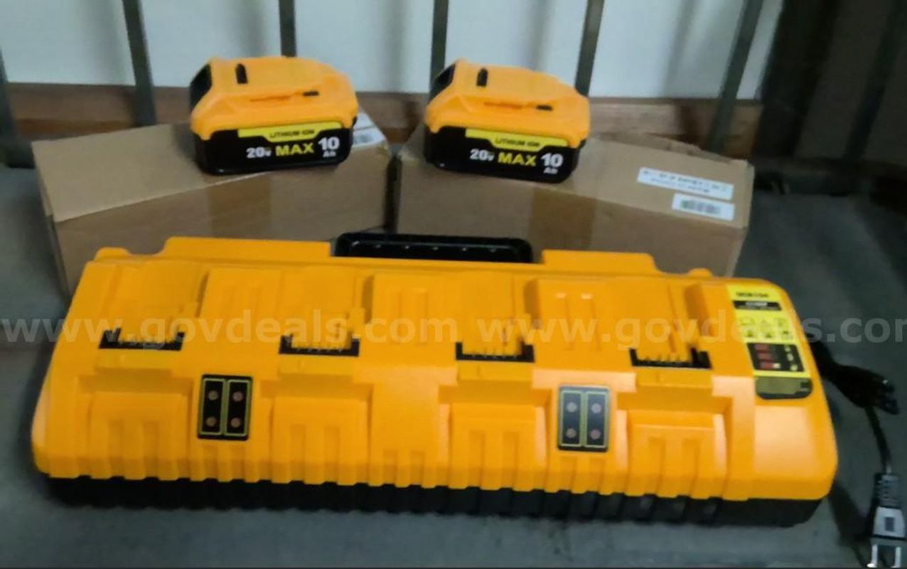 NEW IN BOX: Lot of 4 Rechargeable Lithium ION Batteries and 1 Battery Charger