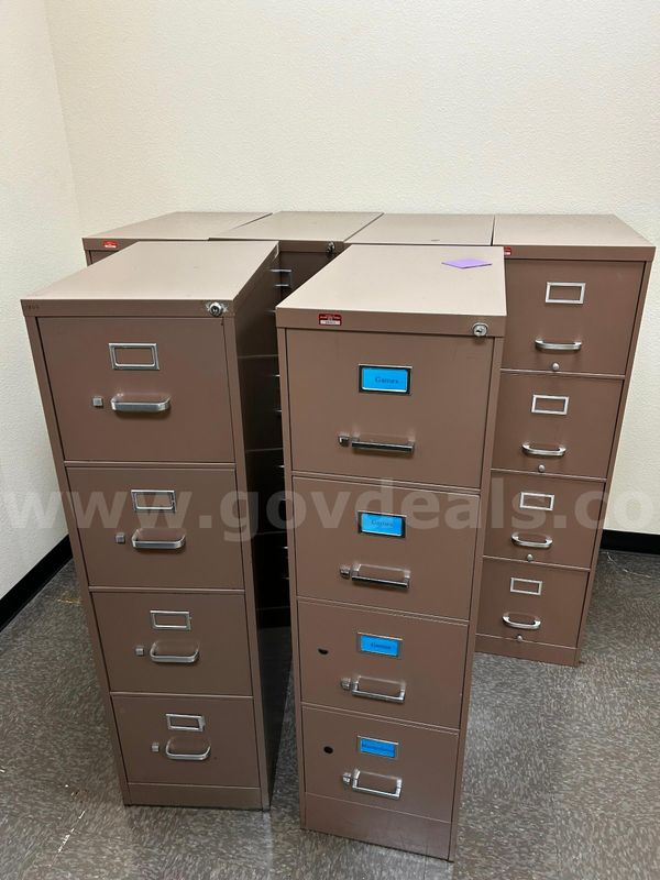 Six 4-drawer filing cabinets