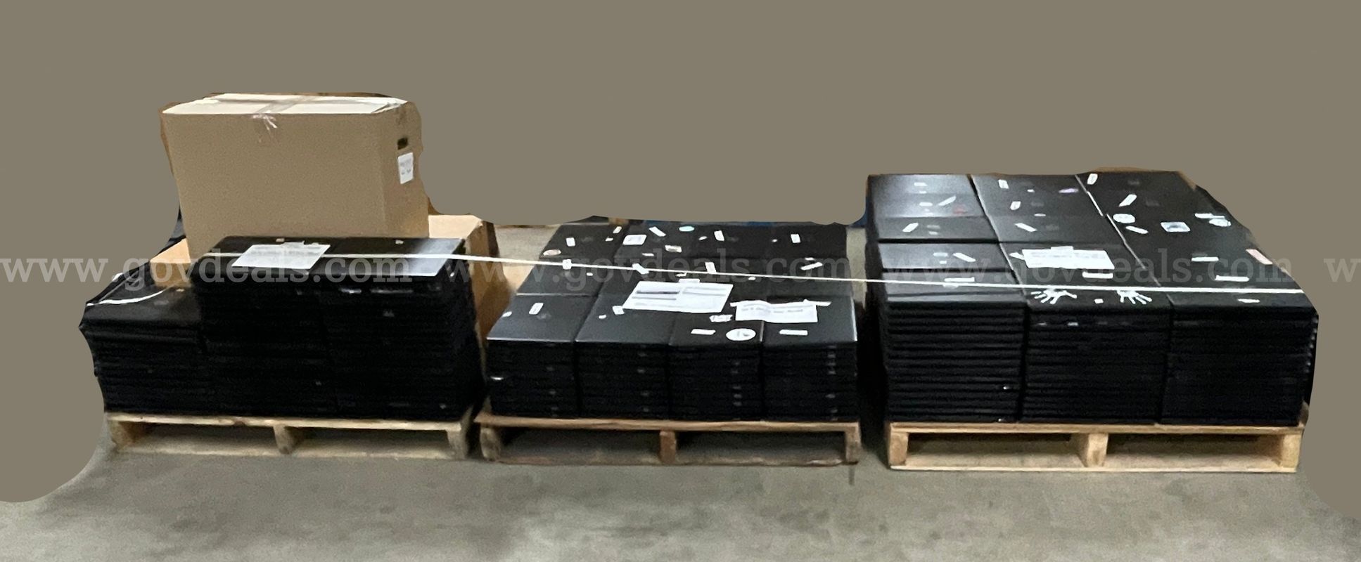 Laptops - Dell Latitude 3490's on 3 pallets. *1 pallet is only partially full and has power bricks on it.