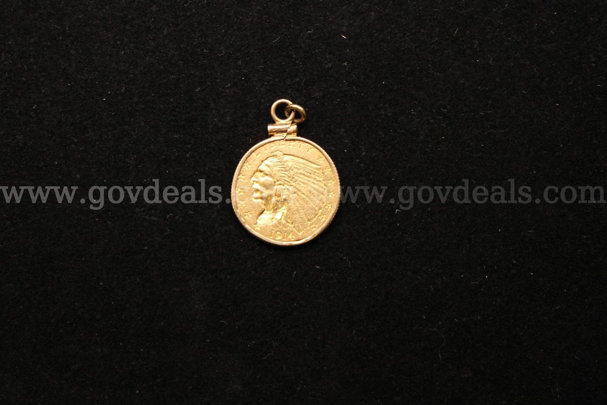 1- 1914 $2 1/2 Indian Head Gold Coin In A Gold Colored Bezel