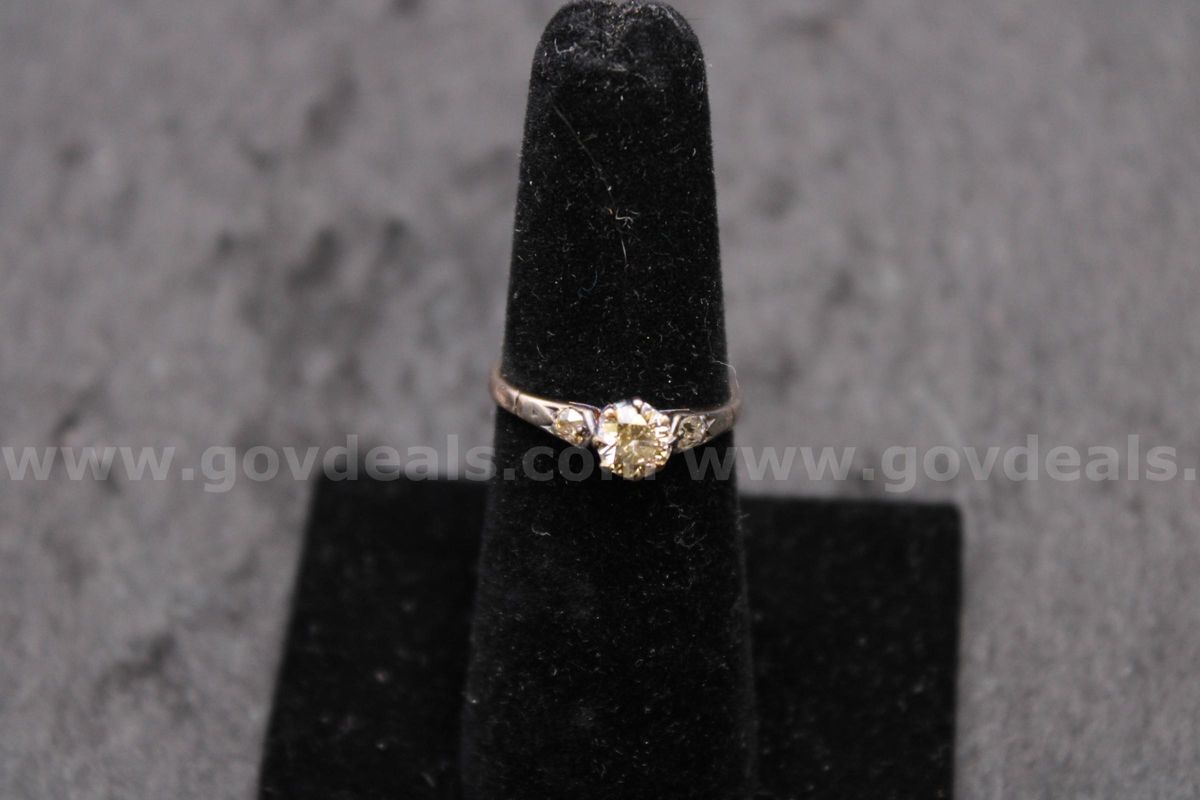 1- gold colored ring