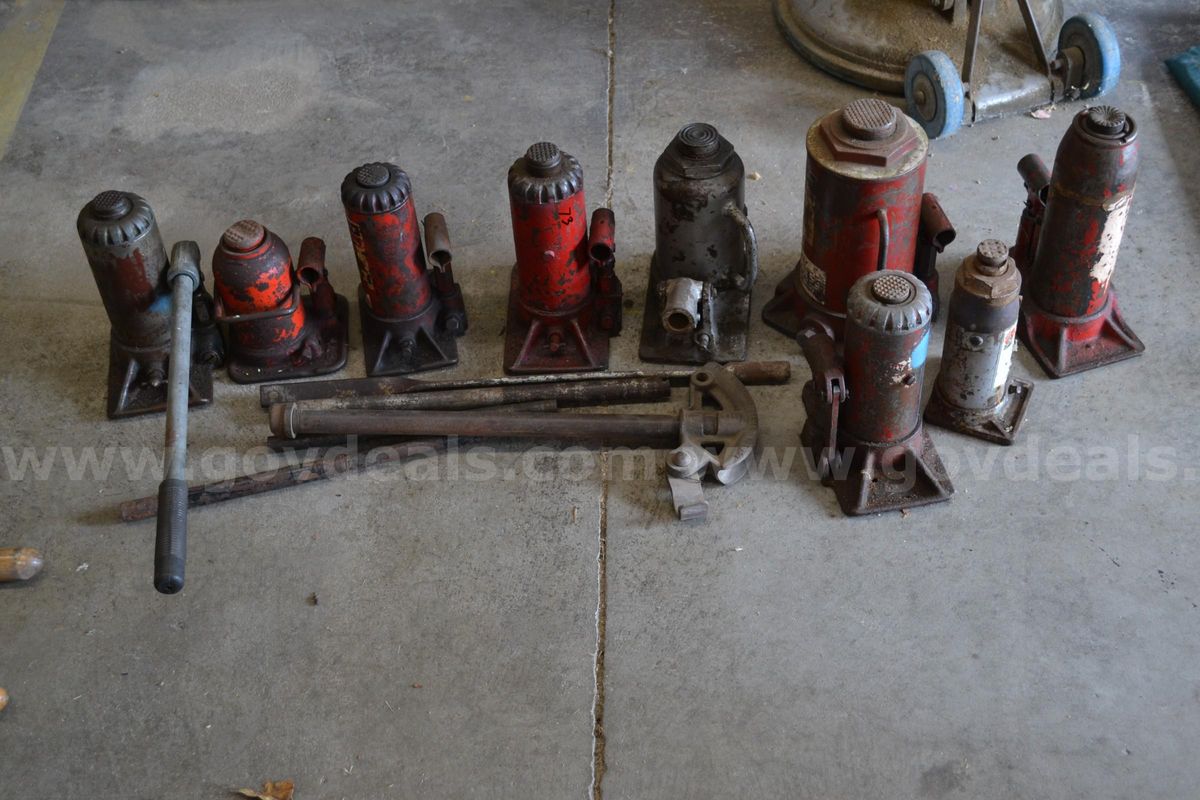 Lot to include nine (9) Bottle jacks with misc. handles
