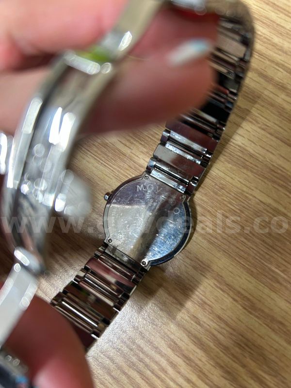 Movado silver colored watch