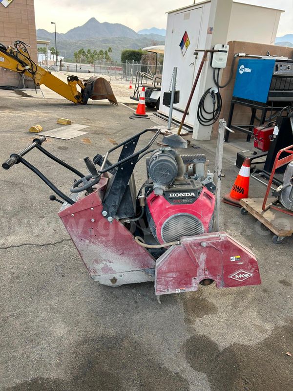 Used MK self propelled walk behind saw