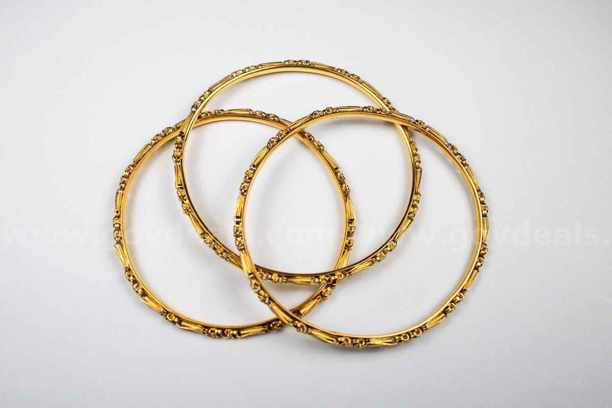 Three Identical 18kt Bangle Bracelets