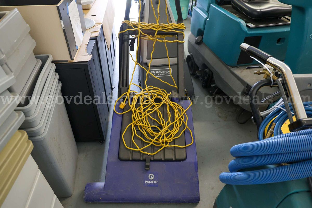 Commercial-grade walk-behind Vacuum