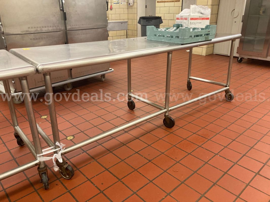 Lot of 4 stainless steel tables - 8ft - each on wheels (1 of 10)