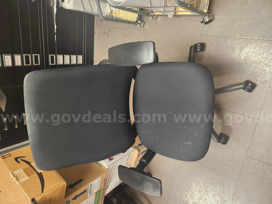 Black computer chair - stained