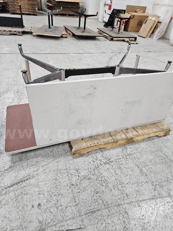 10 Tables in various sizes up for auction. Sold As Is.