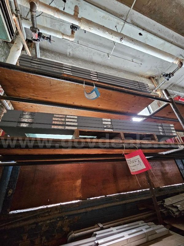 13 Metal Doors and 26 Stacks of Metal Door Bucks. Sold As Is.