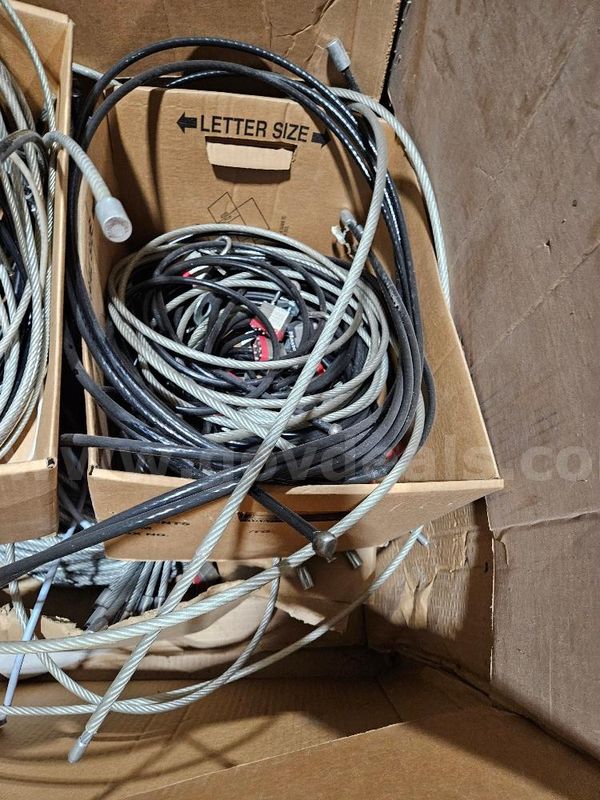Approx. 100 Loose Security Cables & Master Locks in various colors. Sold As Is.