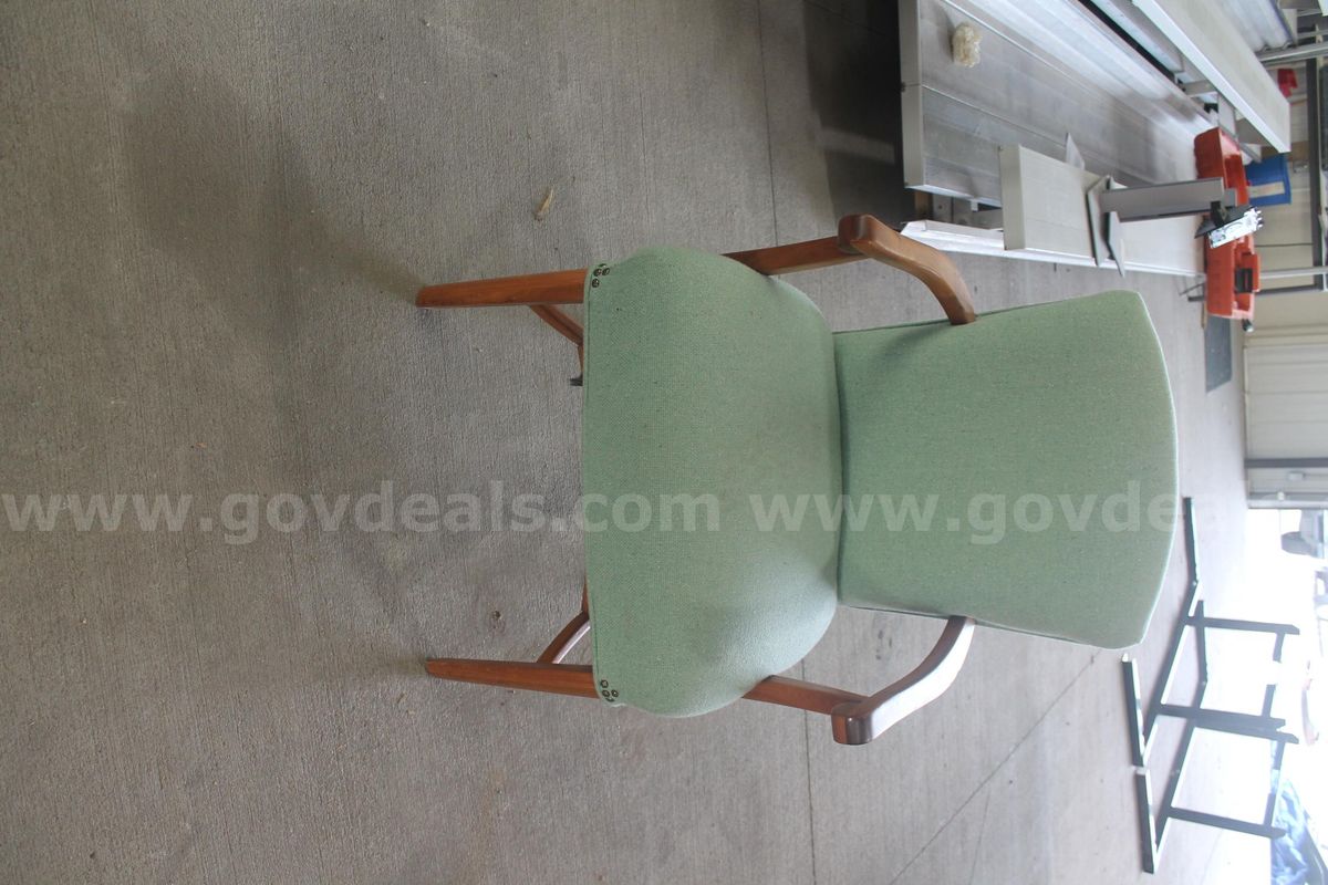 3 wooden chairs, green fabric cushioning