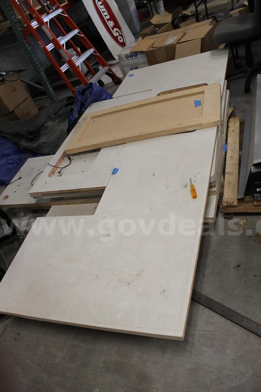 Miscellaneous white colored counter tops.