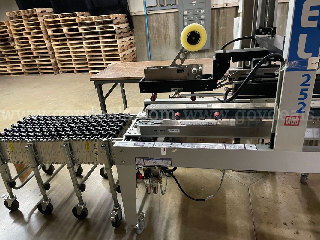 Wexxar BEL 252 Case Former & BEL 505 Case Sealer Packaging Line