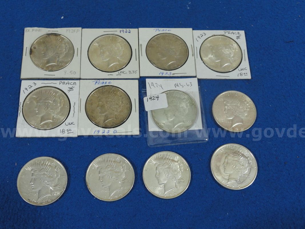 Lot of 12 Peace Silver Dollars (different years, mint marks, condition)