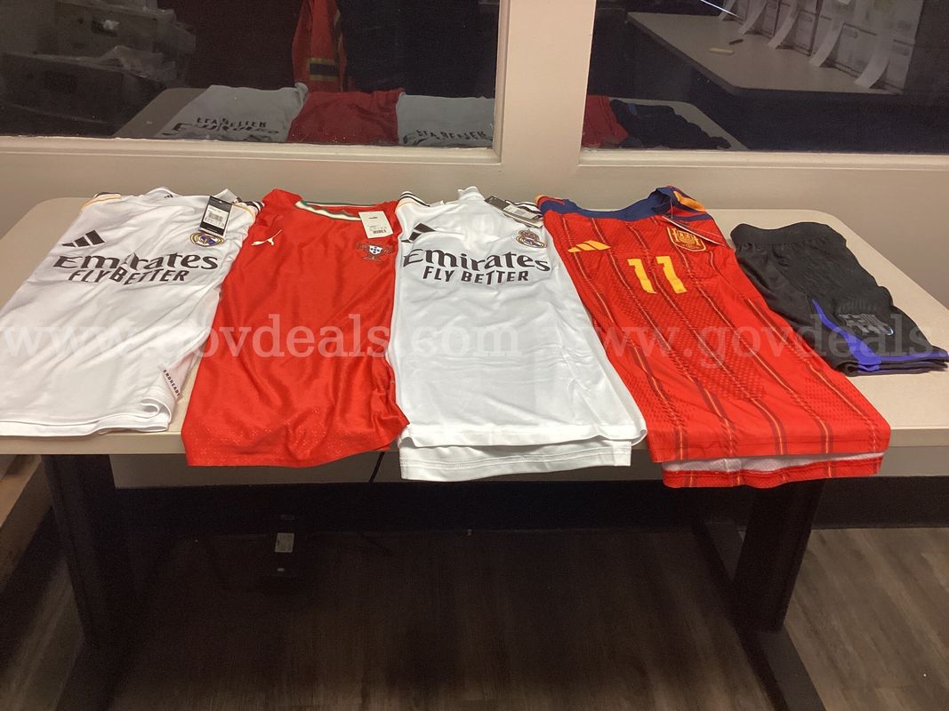 Lot of 4 Soccer Jerseys and one pair of Shorts